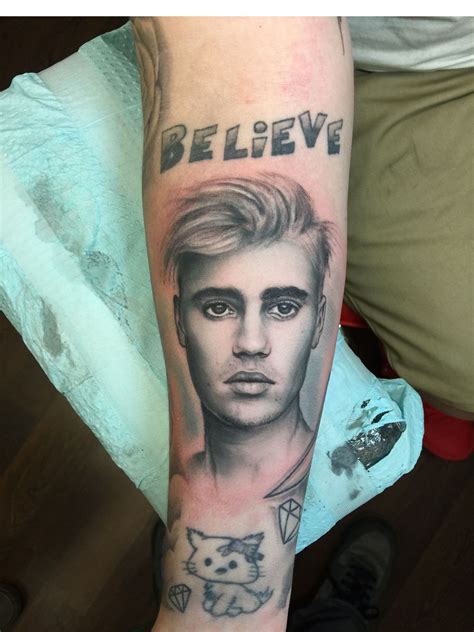 justin bieber tattoo|justin bieber tattoos anyone video.